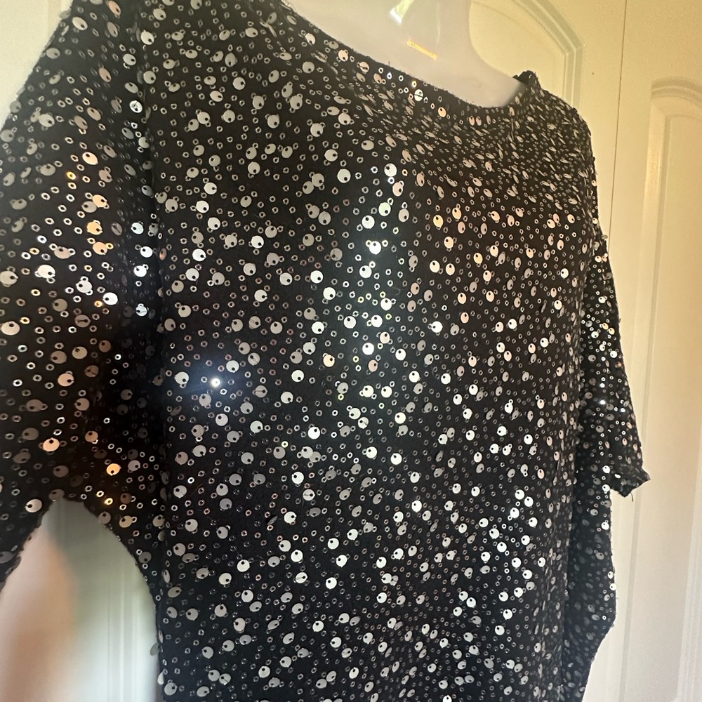 Gossip girl black sequined flirty asymmetrical top. Tunic length.